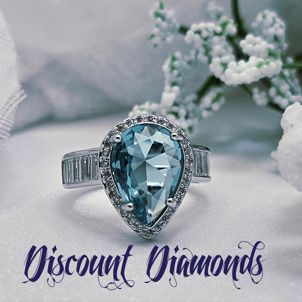 Aquamarine Cocktail Ring flanked by Round & Rectangular Cut Sapphire on 925